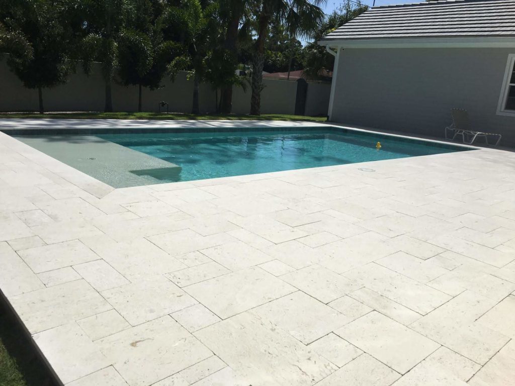 travertine pavers around pool