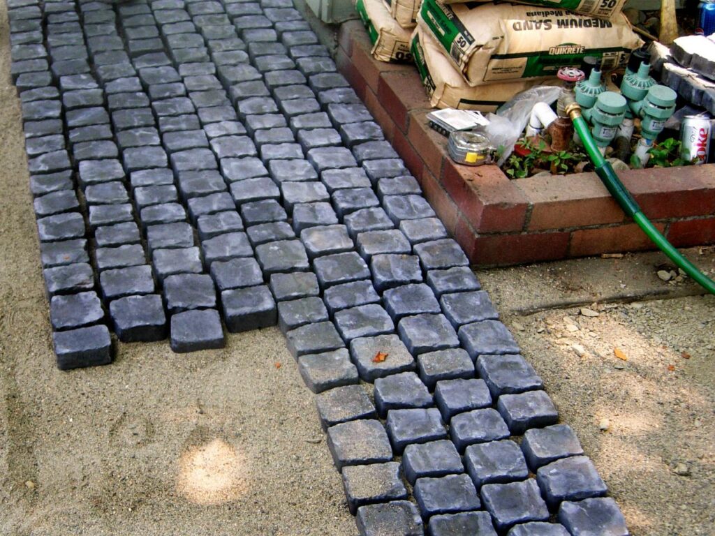 Pavers on top of sand in a quick installation.