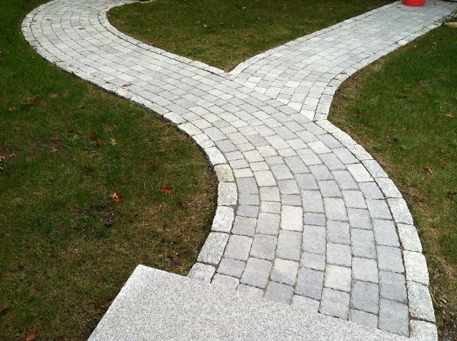 Curved walkway with straight pavers