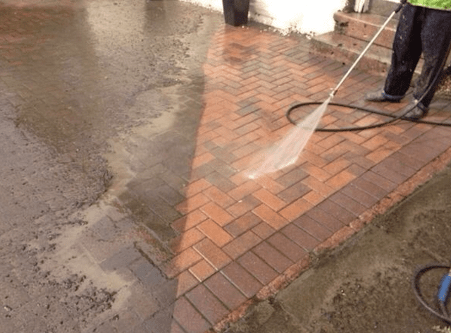 Pressure washing pavers