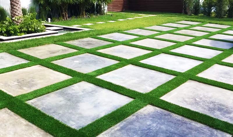 square pavers on grass