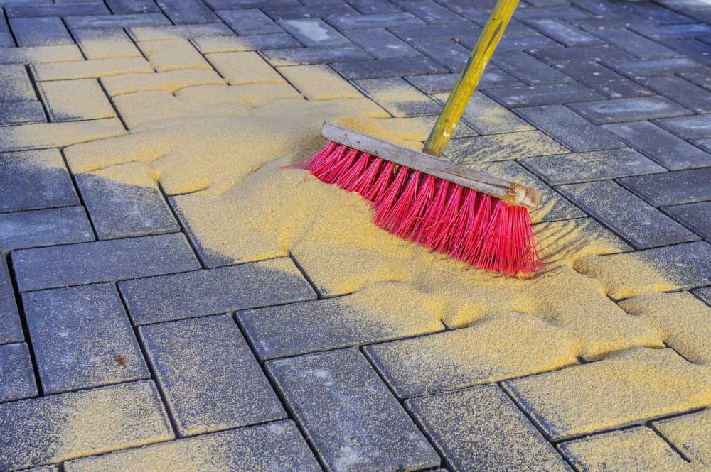 What Is Polymeric Sand? How to Use It for Paver Installation