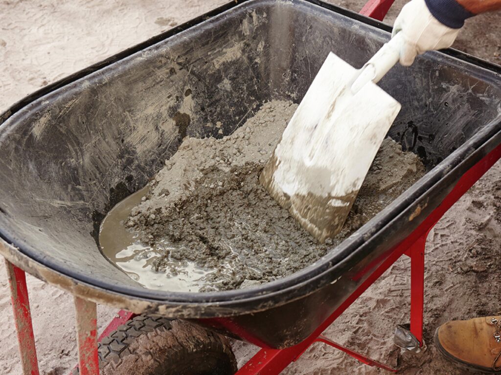 Mixing concrete: Can you pour concrete over brick pavers?