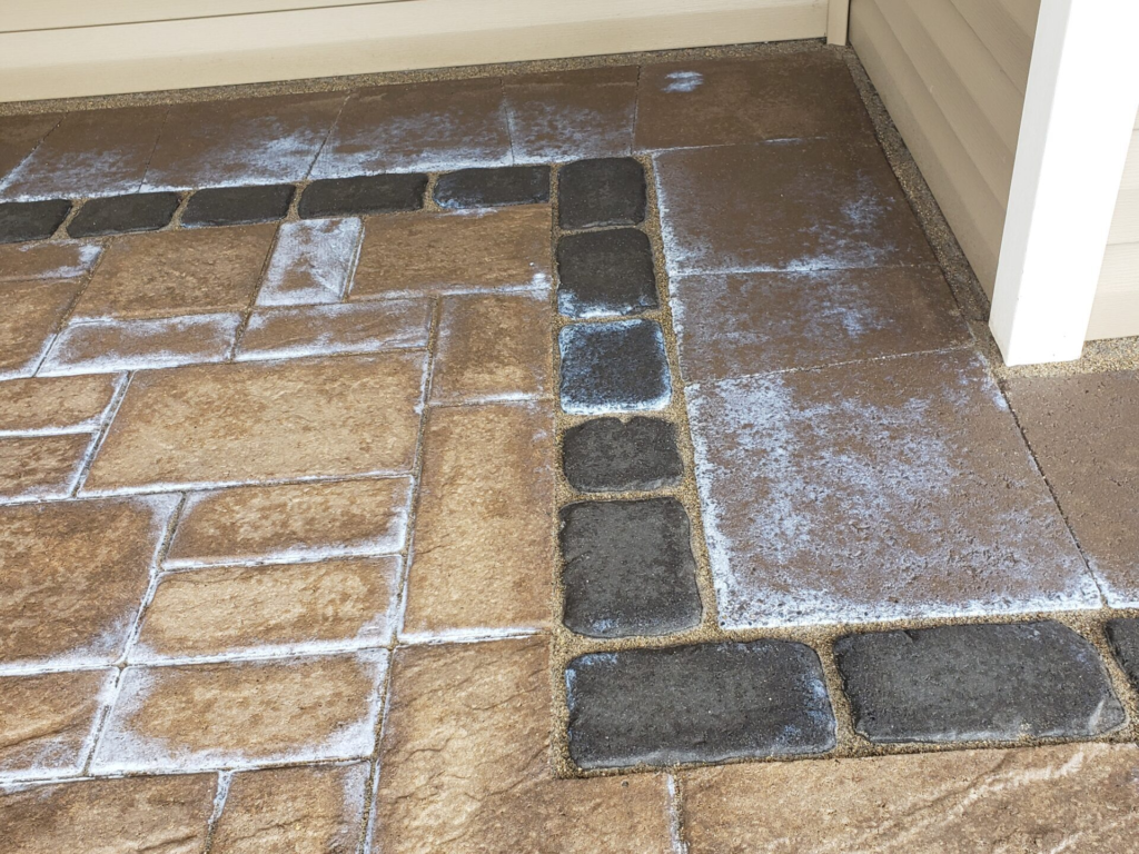 how to clean cement from pavers